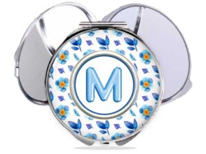 sky blue floral print pocket mirror, item SKU COMP456A., variation image front view to show the design details.