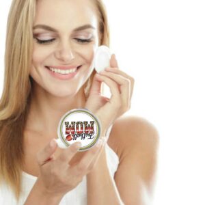 basketball mom compact mirror, being used by a woman applying makeup