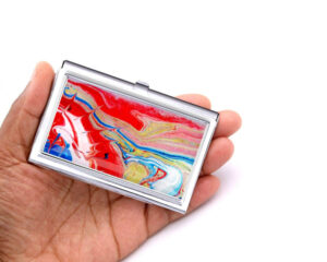 Custom Business Card Holder Bus45, Laying On A woman's Hand To Show The Size. Designed By Terlis Designs.