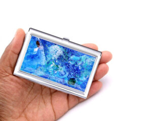 Ocean Art Business Card Organizer Bus159, Laying On A woman's Hand To Show The Size. Designed By Terlis Designs.
