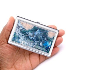 Ocean Art Credit Card Keeper Bus189, Laying On A woman's Hand To Show The Size. Designed By Terlis Designs.