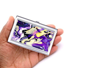 Silver Credit Card Holder Bus30, Laying On A woman's Hand To Show The Size. Designed By Terlis Designs.