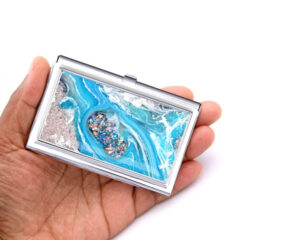 Business Card Holder Bus180, Laying On A woman's Hand To Show The Size. Designed By Terlis Designs.