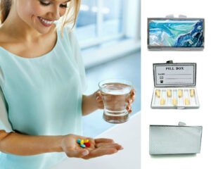 7 day Pill Box - PILB105, being used by a woman holding a glass of water and her pills.