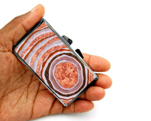 Birth Control Pill Box - PILB115, laying on a woman's hand to show the size, image by Terlis Designs.