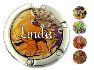 Custom name metal purse hook, item sku PURH69, front view to show the design details, by terlis designs.