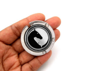 Yin yang handbag hanger for bar, item sku PURH418S1C, laying on a woman's hand to show the size image by Terlis Designs.