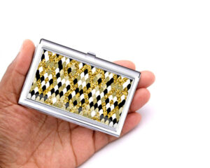 Custom Name business card case - BUS450B - Hand Shot, laying on a woman's hand to show the size, image by Terlis Designs.