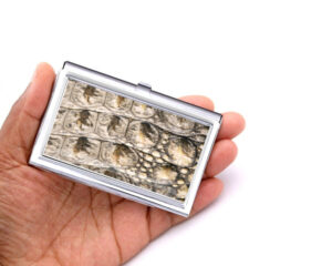 Custom Name metal business card case - BUS447B - Hand Shot, laying on a woman's hand to show the size, image by Terlis Designs.