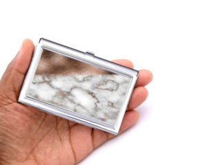 Custom Name silver business card case - BUS427B - Hand Shot, laying on a woman's hand to show the size, image by Terlis Designs.