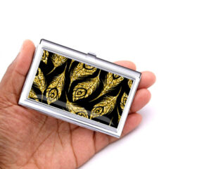 Custom Name stainless steel credit card holder - BUS451B - Hand Shot, laying on a woman's hand to show the size, image by Terlis Designs.