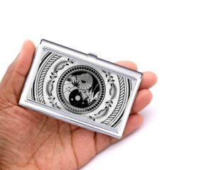 Yin Yang pocket business card case - BUS418S3 - Hand Shot, laying on a woman's hand to show the size, image by Terlis Designs.