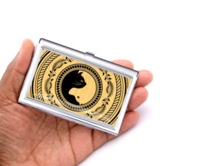 Yin Yang stainless steel business card case - BUS418B2 - Hand Shot, laying on a woman's hand to show the size, image by Terlis Designs.