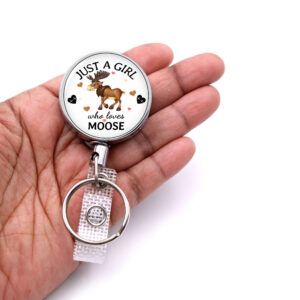Just A Girl Who Loves Foxes retractable badge reel - BADR420 - laying on a woman's hand to show the size. Designed By Terlis Designs.