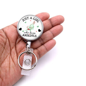 Just A Girl Who Loves Turtles badge reel - BADR423 - laying on a woman's hand to show the size. Designed By Terlis Designs.