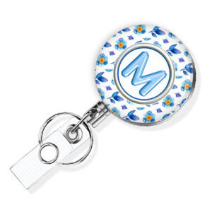 Sky Blue Floral Print nurse pediatrics badge reel - BADR456A - Main Image front view to show the design details. Created by Terlis Designs.