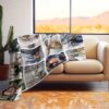 Custom Family Photo Collage Blanket - BLANAJ1, laying over the back and seat of a plush beige sofa. Image by Terlis Designs.