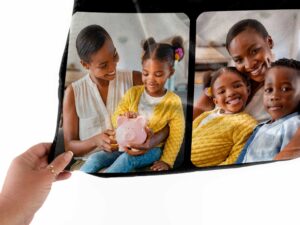 Custom Family Photo Collage Blanket with Text - BLANQM, closeup view of the blanket held between the thumbs and fingers.