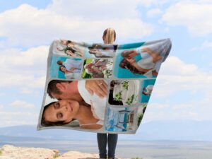 Custom Family Wedding Photo Blanket - BLANAC1, showing a lady camping outdoors wearing the plush blanket over her shoulders.