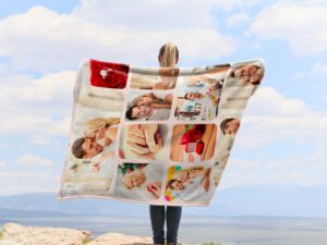 Custom Mom Engagement Photo Collage Blanket - BLANAH1, showing a lady camping outdoors wearing the plush blanket over her shoulders.