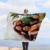 Family Photo Collage Personalized Memorial Blanket - BLANA1, showing a lady camping outdoors wearing the plush blanket over her shoulders.