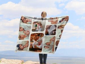 Personalized Baptism Photo Collage Blanket - BLANAE1, showing a lady camping outdoors wearing the plush blanket over her shoulders.