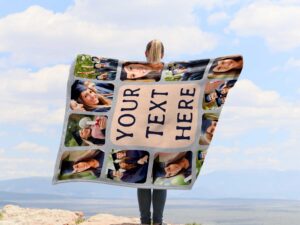 Personalized Graduation Photo Collage Blanket - BLANAM1, showing a lady camping outdoors wearing the plush blanket over her shoulders.
