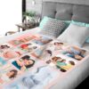 Personalized Newborn Photo Collage Blanket - BLANAN1, laid over a queen sized bed to show the plush blanket in use.