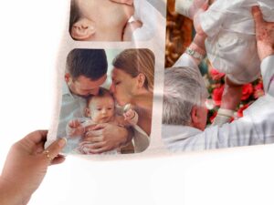 Personalized Photo Collage Blanket - BLANAF2, closeup view of the blanket held between the thumbs and fingers.