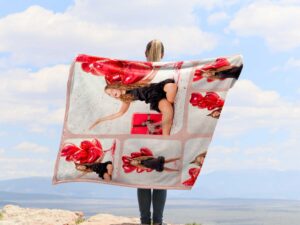Sweet 16 Custom Photo Collage Birthday Blanket - BLANS1, showing a lady camping outdoors wearing the plush blanket over her shoulders.